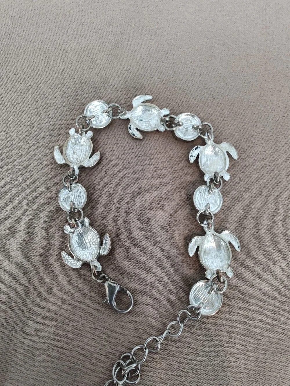 Silver Tone Turtle Link Bracelet with Light Blue Cabochons